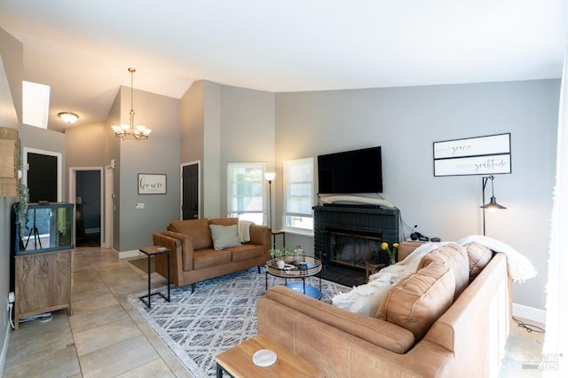 829 Winton Dr, Petaluma, CA 94954 - living area with a fireplace, baseboards, a chandelier, and high vaulted ceiling