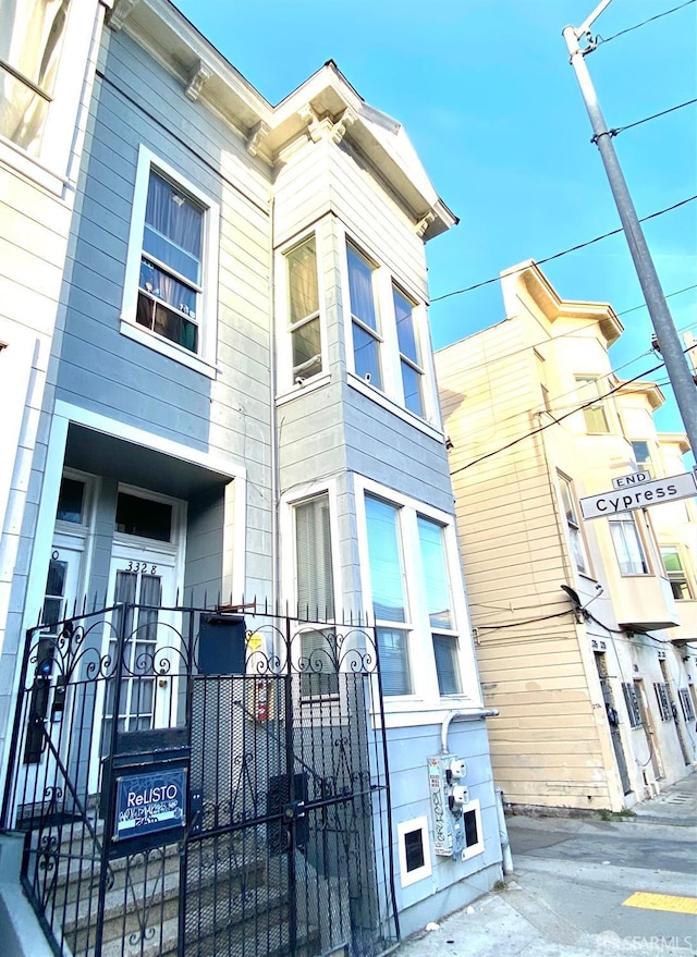 3328 26th St, San Francisco, CA 94110 - view of front of house featuring a fenced front yard