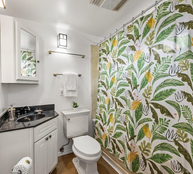 16635 Center Way, Guerneville, CA 95446 - full bathroom with toilet, vanity, baseboards, and curtained shower