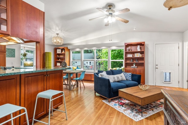 16635 Center Way, Guerneville, CA 95446 - living room featuring vaulted ceiling, light wood finished floors, and ceiling fan