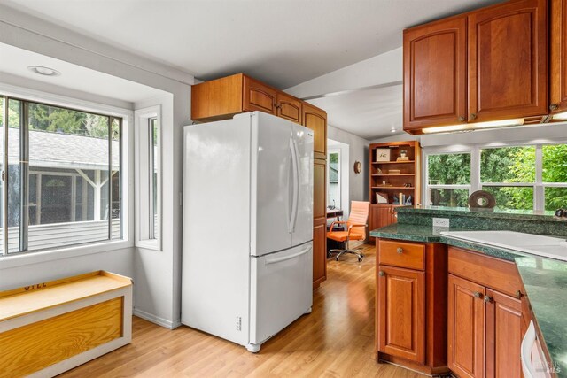 16635 Center Way, Guerneville, CA 95446 - kitchen with freestanding refrigerator, plenty of natural light, a desk, light wood-type flooring, and vaulted ceiling