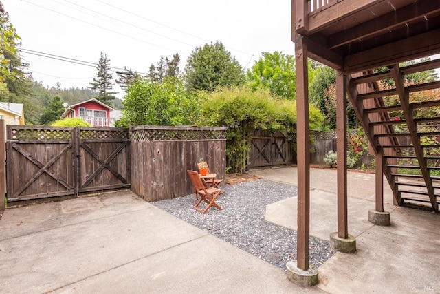 16635 Center Way, Guerneville, CA 95446 - view of patio with a gate, fence, and stairway