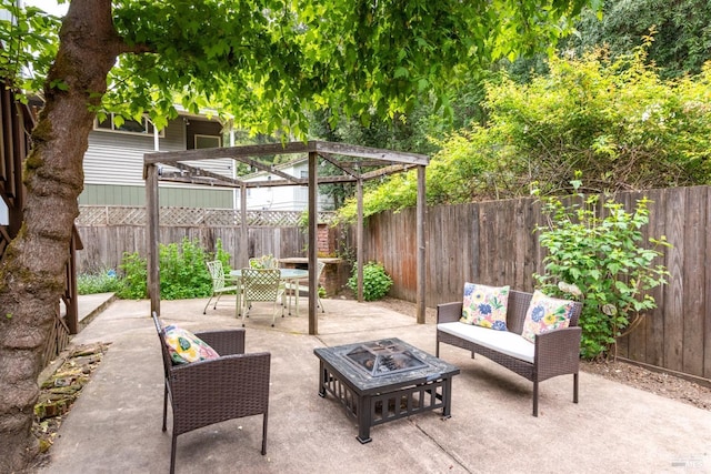 16635 Center Way, Guerneville, CA 95446 - view of patio featuring a fenced backyard, outdoor dining area, and an outdoor living space with a fire pit