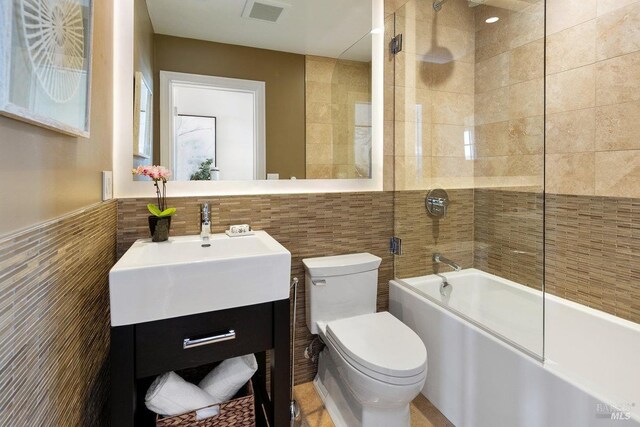 12 Nunes Dr, Novato, CA 94945 - full bath featuring tile walls, toilet, enclosed tub / shower combo, and vanity