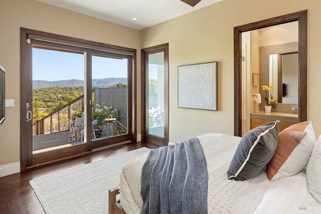 12 Nunes Dr, Novato, CA 94945 - bedroom with a mountain view, wood finished floors, ensuite bathroom, baseboards, and access to exterior