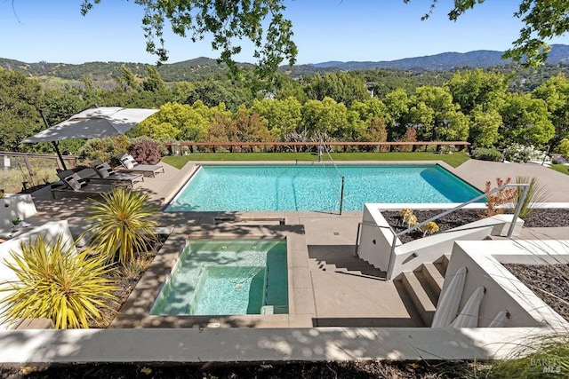 12 Nunes Dr, Novato, CA 94945 - outdoor pool with an in-ground hot tub, a mountain view, a patio, and fence