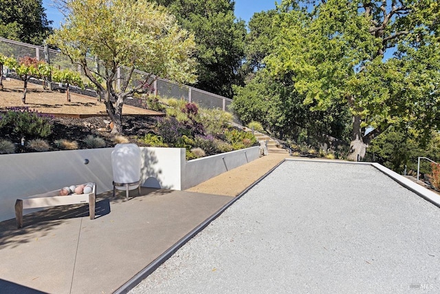 12 Nunes Dr, Novato, CA 94945 - view of community with a game area, fence, and view of scattered trees