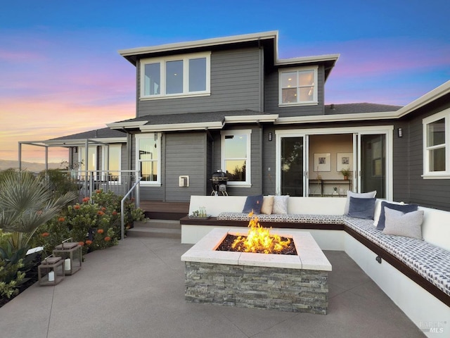 12 Nunes Dr, Novato, CA 94945 - back of house featuring a patio area and an outdoor living space with a fire pit