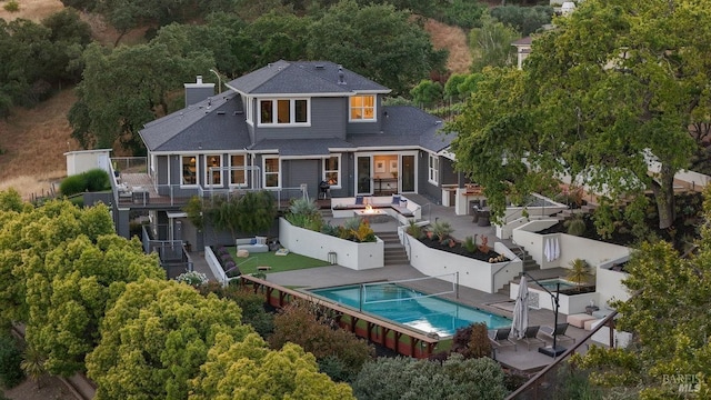 12 Nunes Dr, Novato, CA 94945 - rear view of property with an outdoor pool, a wooden deck, and a fenced backyard