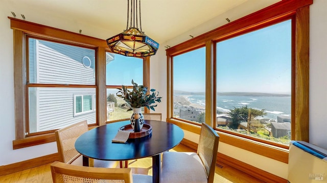 sunroom with a water view
