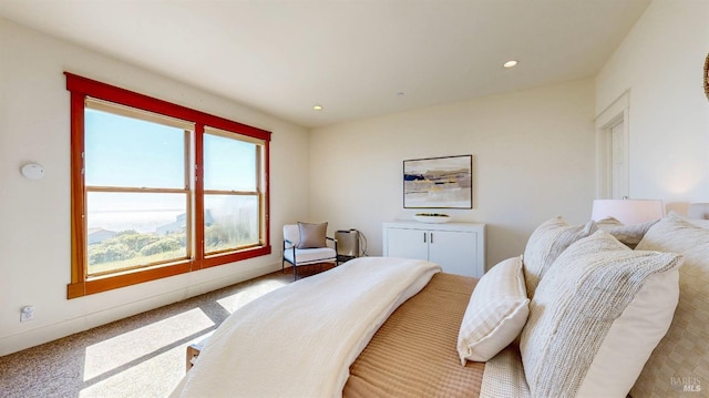 bedroom featuring carpet and recessed lighting