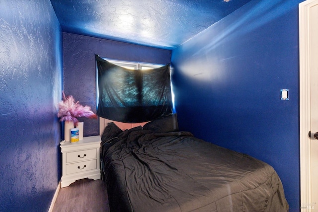 400 Wolfe St, Vallejo, CA 94590 - bedroom featuring wood finished floors, a textured ceiling, and a textured wall