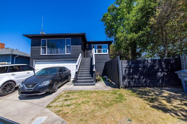 400 Wolfe St, Vallejo, CA 94590 - view of front of home featuring stairway, driveway, and an attached garage