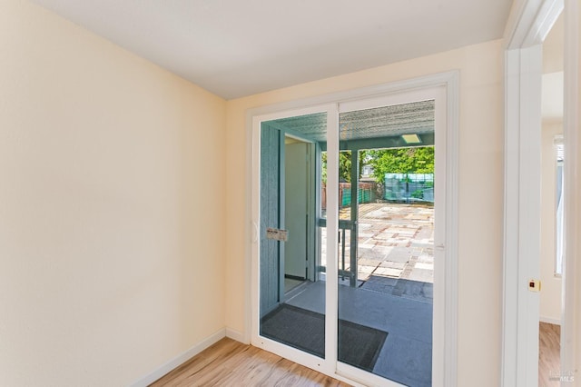 213 Sperry Ave, Vallejo, CA 94590 - entryway with baseboards and light wood finished floors