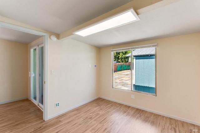 213 Sperry Ave, Vallejo, CA 94590 - empty room with wood finished floors, baseboards, and a smoke detector