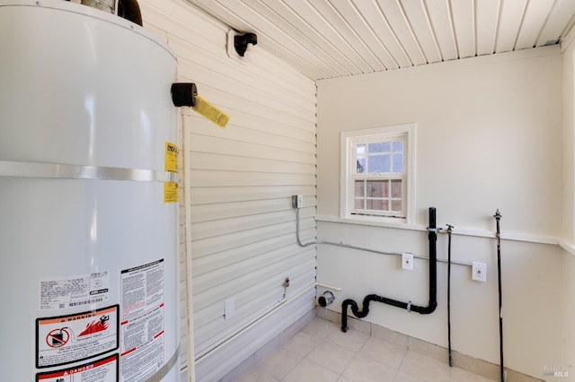 213 Sperry Ave, Vallejo, CA 94590 - washroom featuring water heater, light tile patterned flooring, wood walls, and wood ceiling