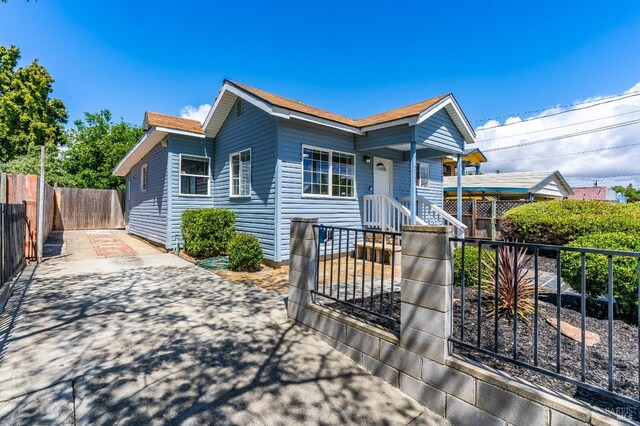 213 Sperry Ave, Vallejo, CA 94590 - view of front of property with driveway and a shingled roof