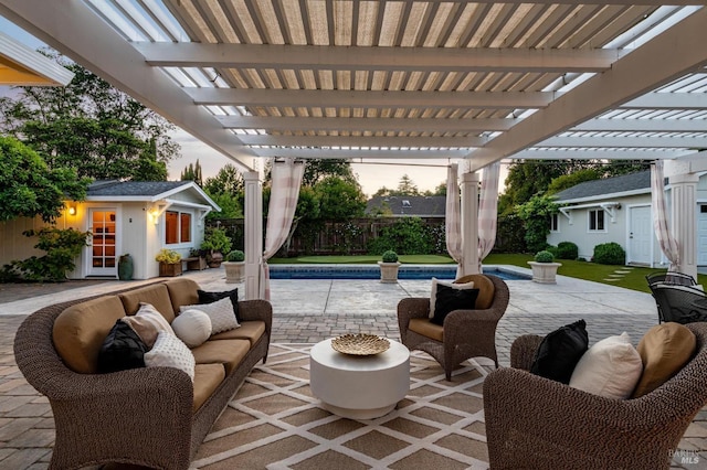 249 Los Palos St, Sonoma, CA 95476 - patio terrace at dusk with an outbuilding, a pergola, and a storage structure