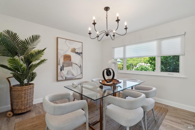 249 Los Palos St, Sonoma, CA 95476 - dining area with a chandelier, baseboards, and wood finished floors