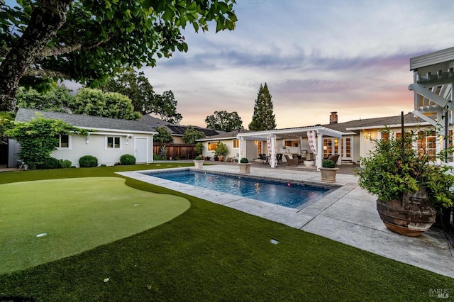 249 Los Palos St, Sonoma, CA 95476 - view of swimming pool with an area to practice putting, a pergola, a patio area, fence, and an outdoor structure