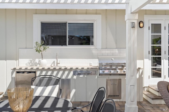 249 Los Palos St, Sonoma, CA 95476 - view of patio / terrace featuring outdoor dining area, an outdoor kitchen, a sink, and a grill