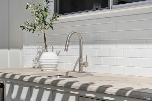 249 Los Palos St, Sonoma, CA 95476 - detailed view of decorative backsplash, a sink, and light stone counters