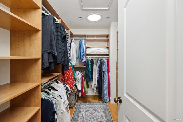 2170 Vineyard Rd, Novato, CA 94947 - walk in closet with attic access and wood finished floors