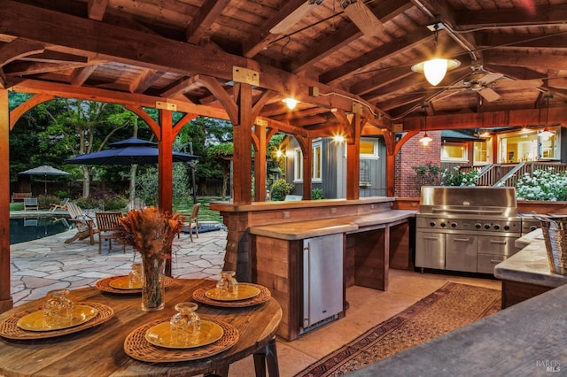 2170 Vineyard Rd, Novato, CA 94947 - view of patio / terrace with exterior kitchen, a grill, a gazebo, a ceiling fan, and outdoor dining space