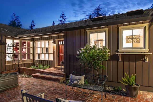 2170 Vineyard Rd, Novato, CA 94947 - back of house with board and batten siding, roof with shingles, and a patio area