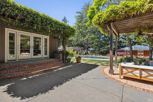 2170 Vineyard Rd, Novato, CA 94947 - view of patio / terrace with french doors, an outdoor pool, an outbuilding, and a shed
