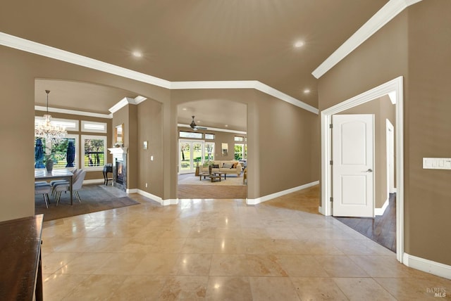 3287 Congressional Ct, Fairfield, CA 94534 - entryway featuring arched walkways, crown molding, a chandelier, recessed lighting, and baseboards