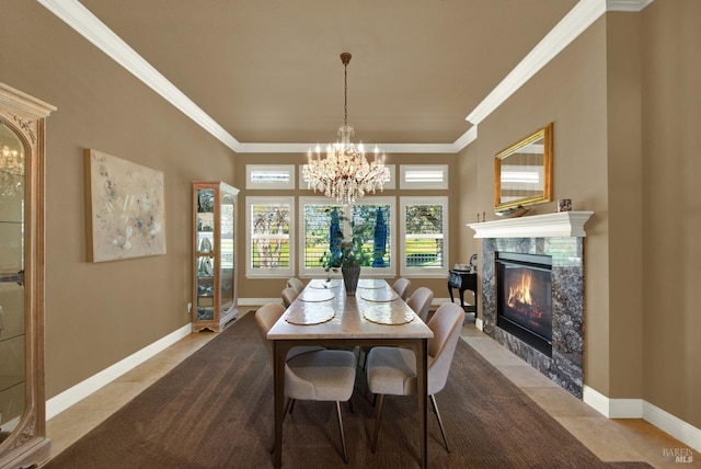 3287 Congressional Ct, Fairfield, CA 94534 - dining room with crown molding, a chandelier, a high end fireplace, tile patterned flooring, and baseboards