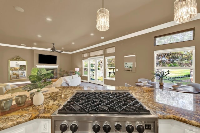 3287 Congressional Ct, Fairfield, CA 94534 - kitchen with recessed lighting, stone counters, a chandelier, crown molding, and open floor plan