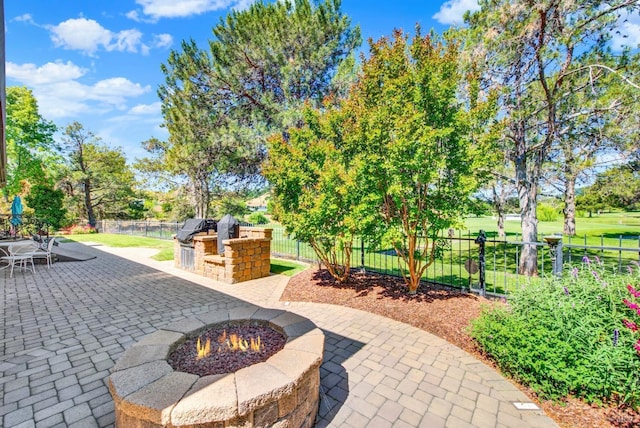 3287 Congressional Ct, Fairfield, CA 94534 - view of patio / terrace with an outdoor kitchen, a fire pit, and a fenced backyard