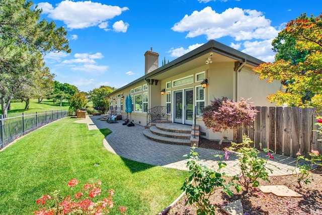 3287 Congressional Ct, Fairfield, CA 94534 - rear view of house featuring a patio area, stucco siding, a chimney, and french doors