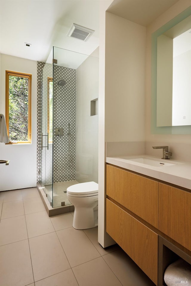 2 Upper Alcatraz Pl, Mill Valley, CA 94941 - bathroom featuring toilet, tile patterned floors, a shower stall, and vanity