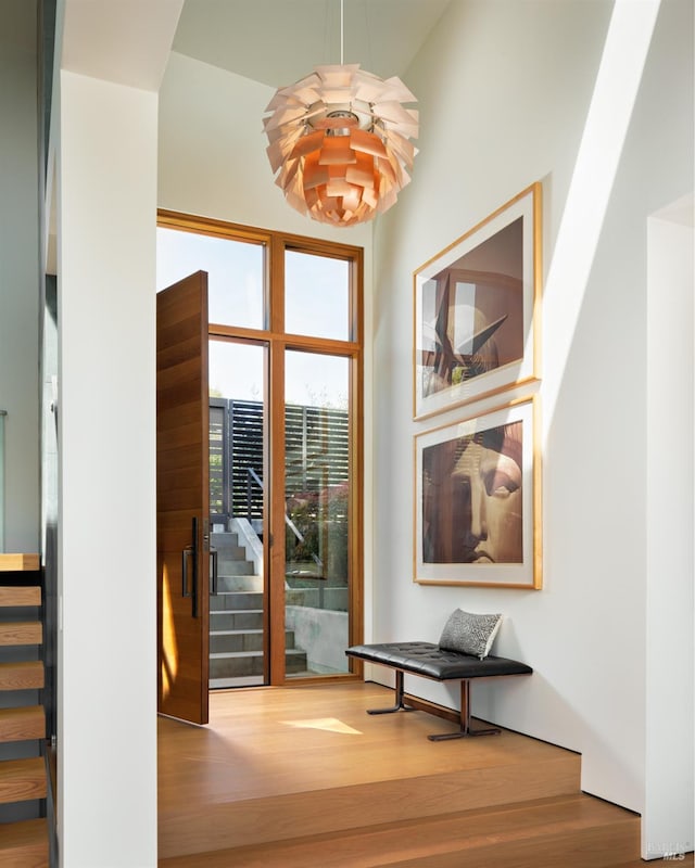 2 Upper Alcatraz Pl, Mill Valley, CA 94941 - entryway featuring stairs, wood finished floors, and a chandelier
