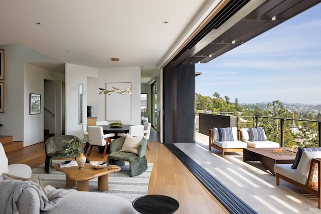 2 Upper Alcatraz Pl, Mill Valley, CA 94941 - living room with wood finished floors and a chandelier