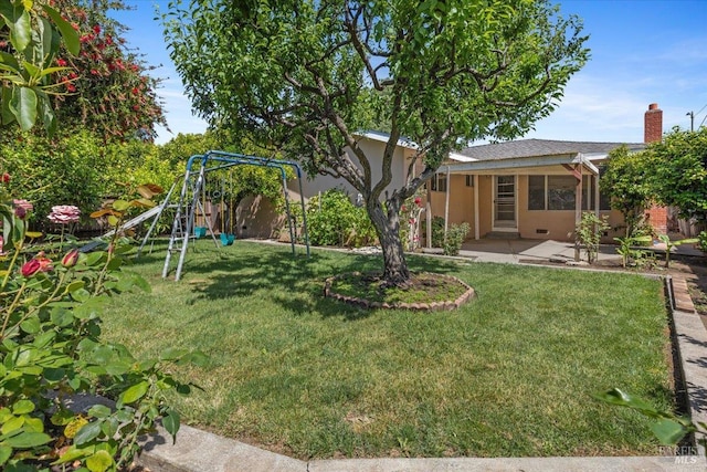 241 Camellia St, Fairfield, CA 94533 - view of green lawn with a playground and a patio area