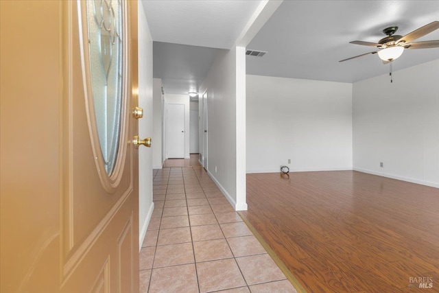 241 Camellia St, Fairfield, CA 94533 - corridor featuring light tile patterned flooring and baseboards