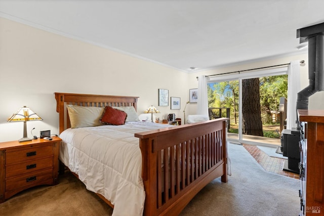 1019 Westside Rd, Healdsburg, CA 95448 - bedroom with carpet, access to exterior, ornamental molding, and a wood stove