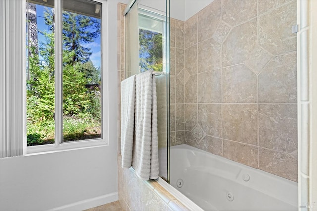 1019 Westside Rd, Healdsburg, CA 95448 - bathroom featuring healthy amount of natural light, a combined bath / shower with jetted tub, and baseboards