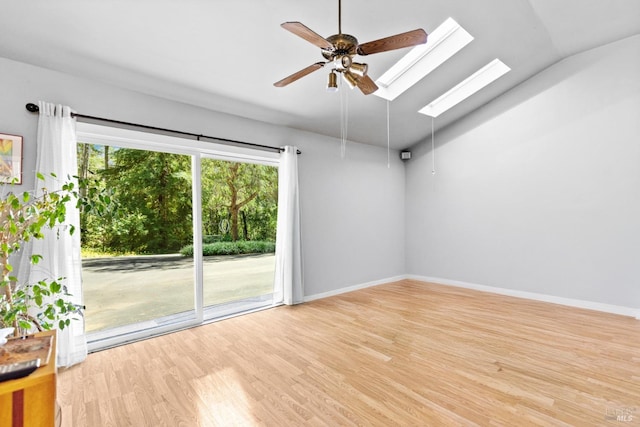 1019 Westside Rd, Healdsburg, CA 95448 - unfurnished room featuring wood finished floors, a ceiling fan, a skylight, lofted ceiling, and baseboards