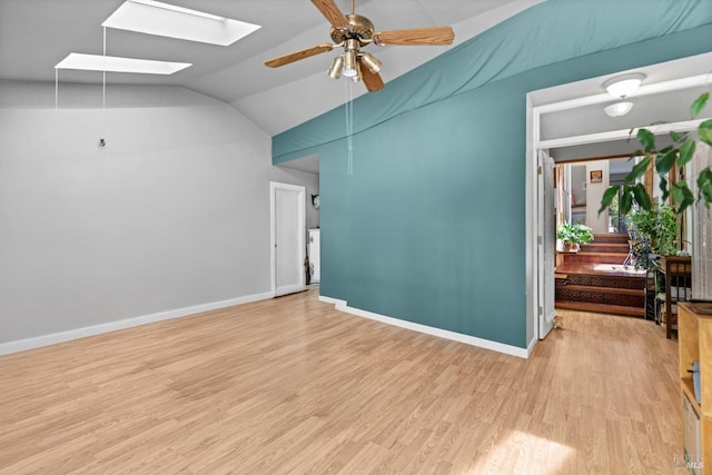 1019 Westside Rd, Healdsburg, CA 95448 - unfurnished living room with a skylight, light wood-style floors, a ceiling fan, baseboards, and lofted ceiling