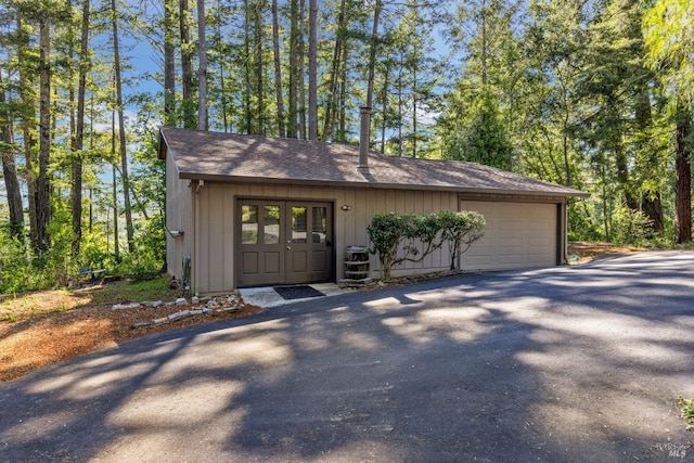 1019 Westside Rd, Healdsburg, CA 95448 - view of property exterior with asphalt driveway, a garage, and a shingled roof