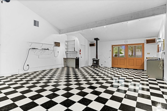 1019 Westside Rd, Healdsburg, CA 95448 - basement featuring a wood stove and tile patterned floors