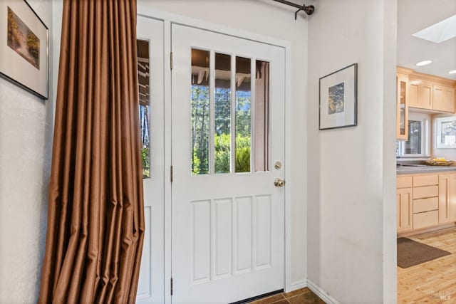 1019 Westside Rd, Healdsburg, CA 95448 - doorway featuring baseboards and a skylight
