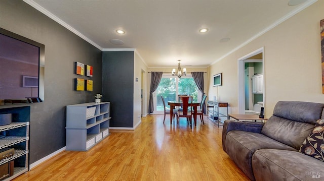 dining space featuring a chandelier, light wood-style flooring, ornamental molding, recessed lighting, and baseboards