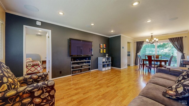 living room with light wood-type flooring, a chandelier, crown molding, recessed lighting, and baseboards