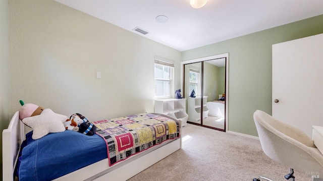 bedroom featuring carpet flooring, a closet, and baseboards